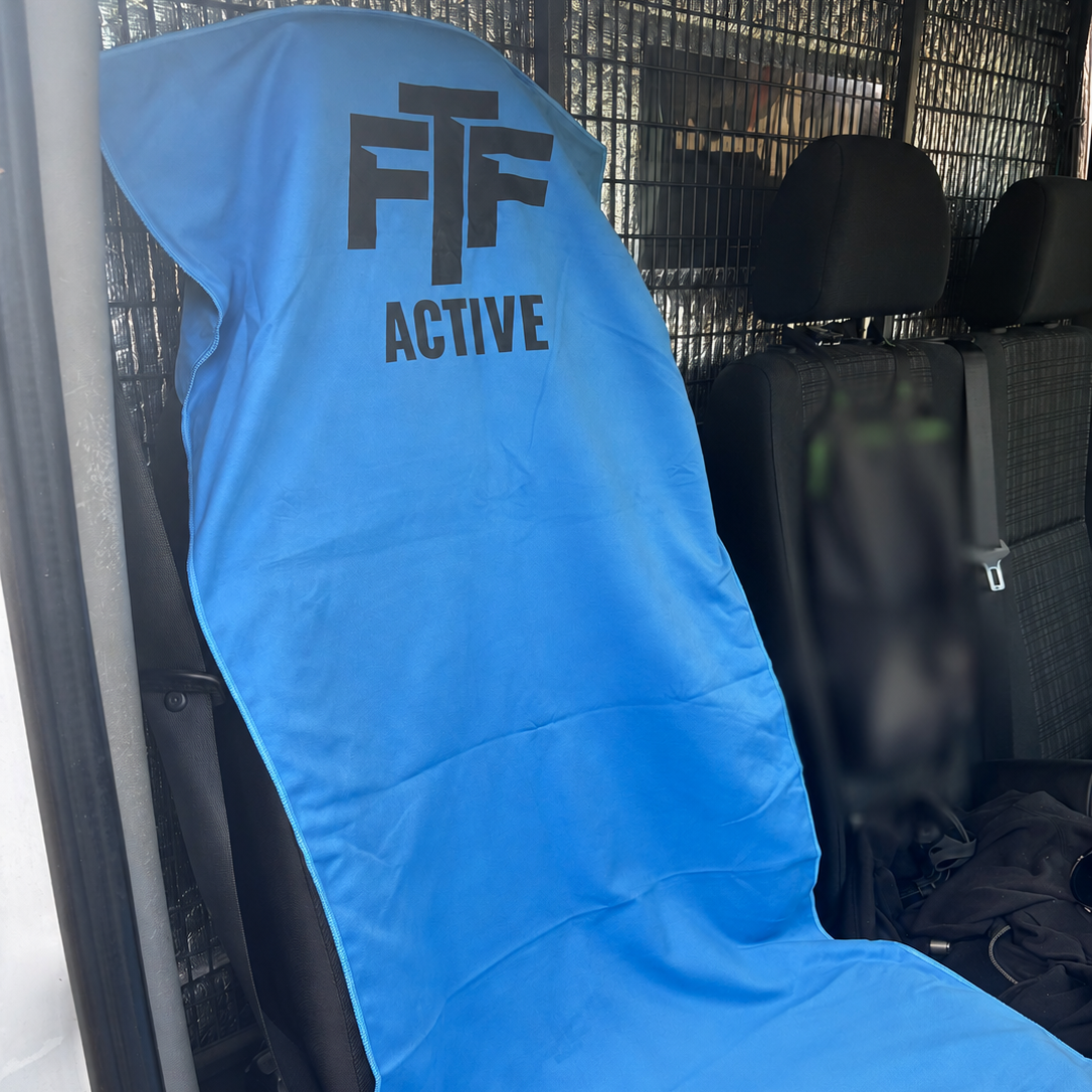 Blue Benchlock gym towel used on car seat